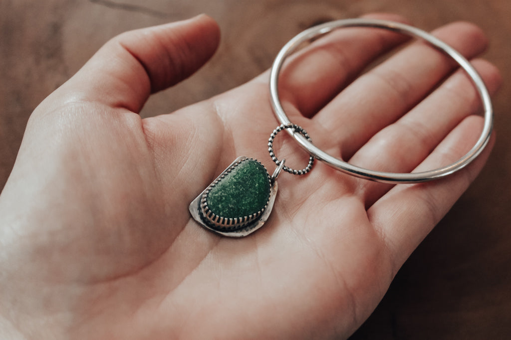 Green sea glass charm bracelet